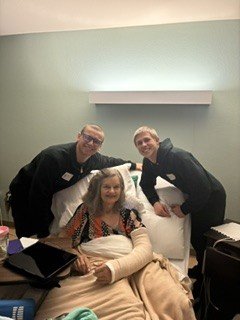 Settled in Texas team members visiting with a client